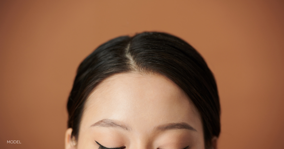 close up of woman's forehead from brows up